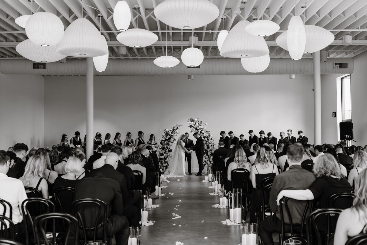 View down the aisle of oa wedding ceremony at one of the best Sioux Falls wedding venues