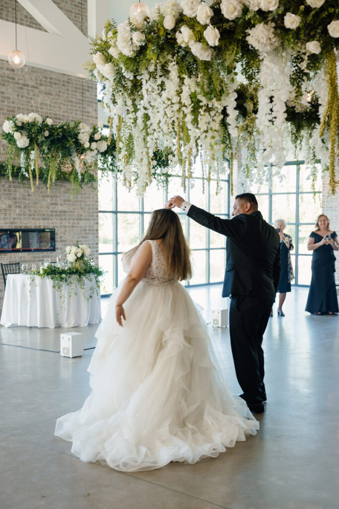 A wedding couple during their first dance 